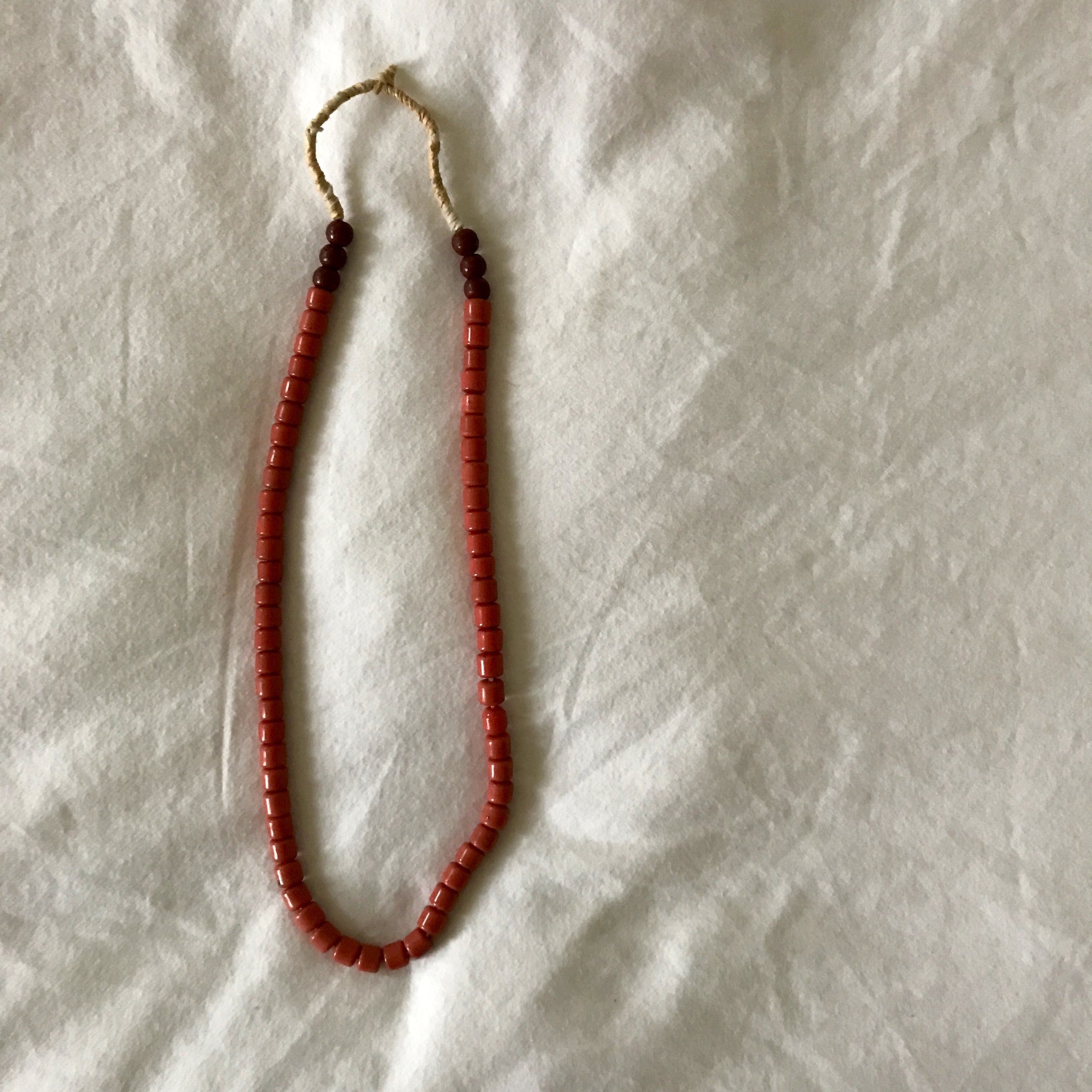 coral and maroon glass beads