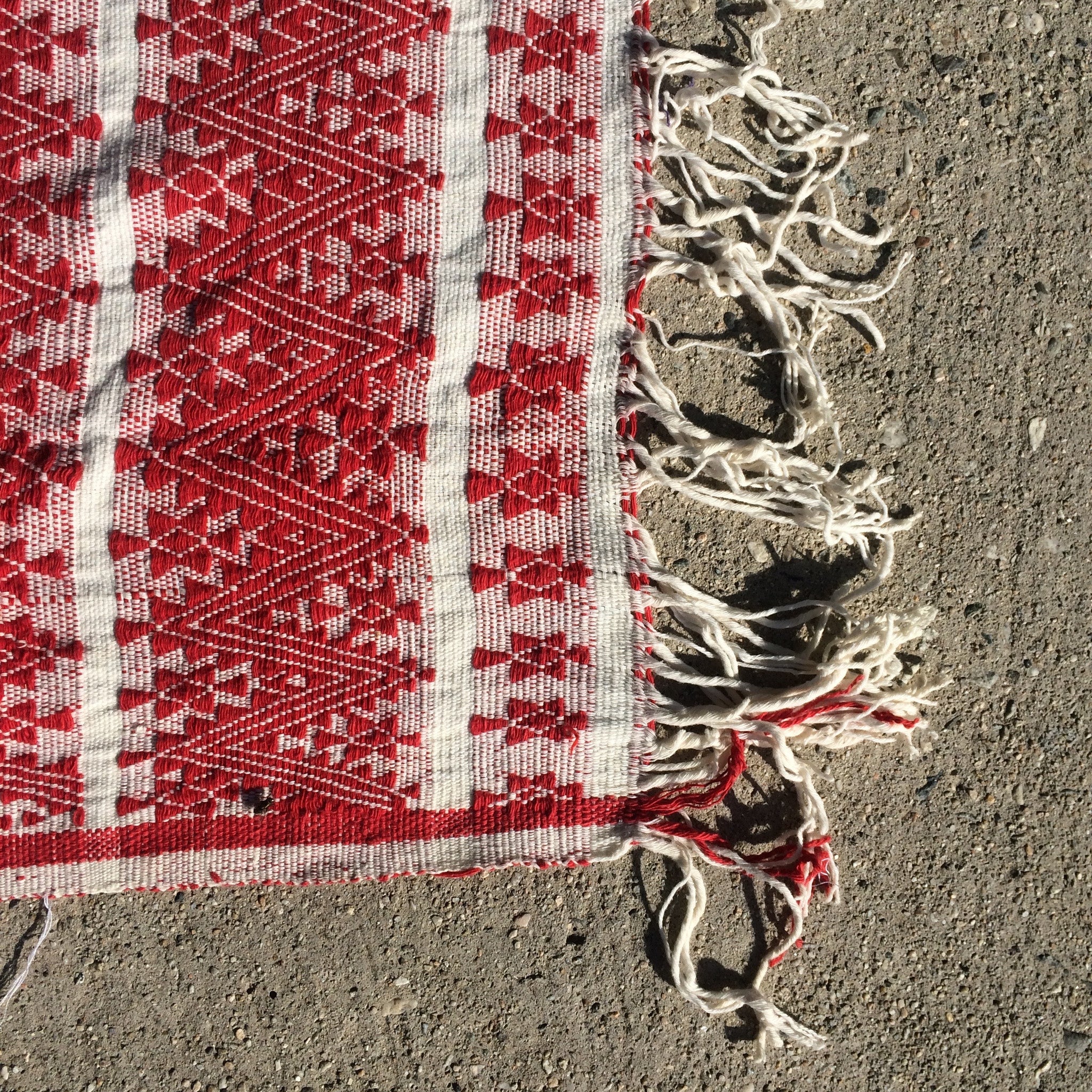 red and cream woven tapestry